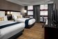 Hotel Standard Double Room Interior design of Furniture in Fabric upholstered headboard and Leather Bed with TV cabinet
