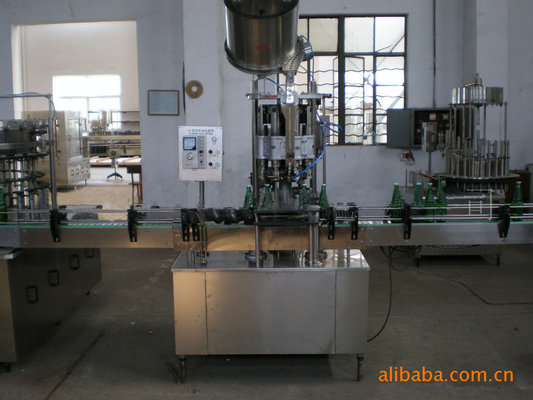 China Automatic glass bottle crown caps capping machine / beer bottle cap sealing machine supplier