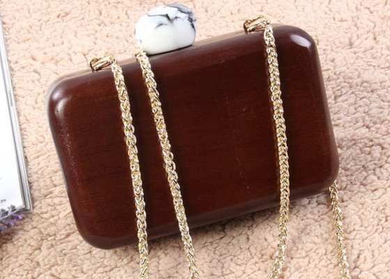 China Elegant Ladies Evening Wooden Clutch Bag With Pearl Clasp Style Closure supplier