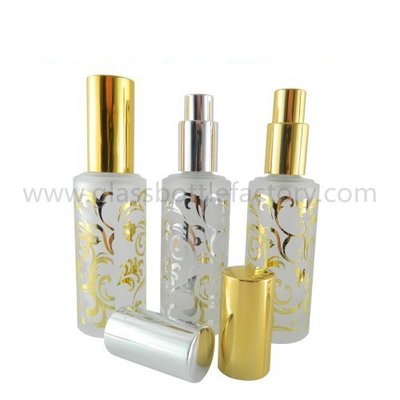 China 50ml Cylindrical Hot Stamping Perfume Glass Bottles With Sprayer And Cap supplier