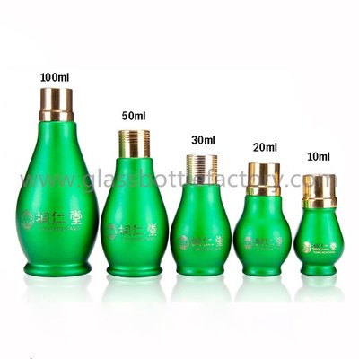 China Single Calabash Color Painting Essential Oil Glass Bottles With Gold Caps supplier