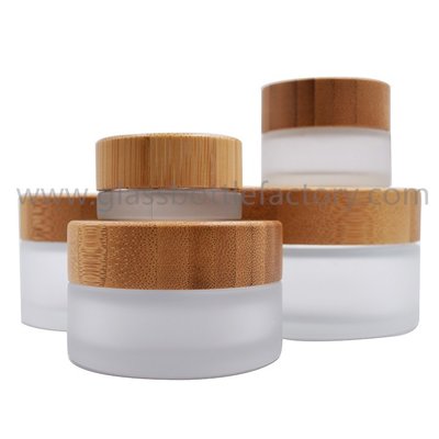 China 5g,15g,30g,50g,100g Frost Round Glass Cosmetic Jars With Bamboo Lids supplier