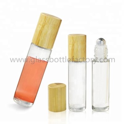 China 10ml Clear Perfume Roll On Bottle With Bamboo Cap and Roller supplier