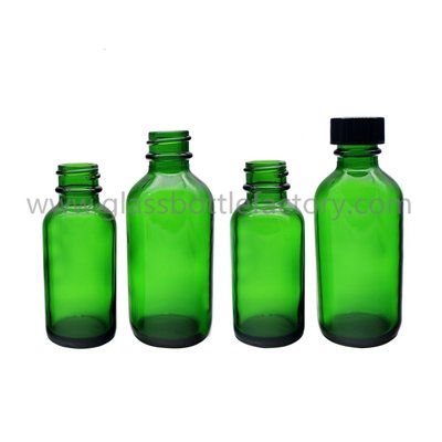 China 1oz and 2oz Green Boston Round Glass Bottles With Black Caps supplier