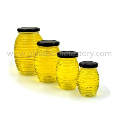 China 100g,250g,500g,1000g Clear Glass Honey Jars With Lids supplier