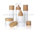 New Items Cylinder Glass Lotion Bottles With Pumps For Skincare and Glass Cream Jars With Wood Caps supplier