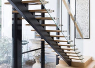 black solid wooden tread staircase with tempered clear glass railing