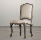 China Rental wholesale wood frame chair linen fabric wooden carved chair event dining chair with upholstered manufacturer