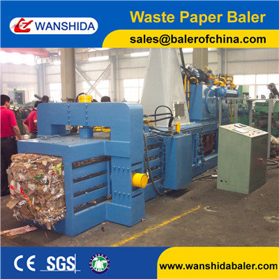 China Full automatic small Waste carton baler recycling miachine controlled by PLC system equipped with 6m long conveyor belt supplier