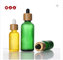 30ml CBD black frosted bottle and bamboo cap with gold print  and round box tube supplier
