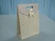 Customized recyclable cardboard paper wedding bags with die cut handle gift pouch supplier
