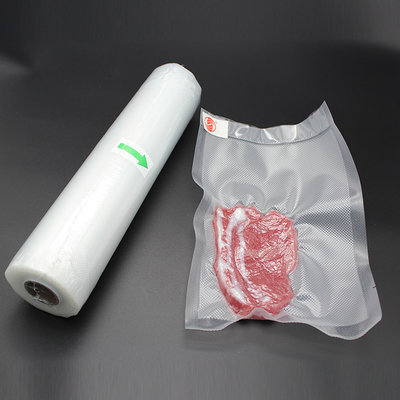 China High transparent puncture resistance one-time use vacuum food sealer plastic packaging bag with tear notch supplier