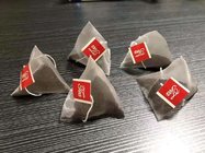 Automatic Biodegradable Nylon Pyramidal Tea Bag Triangle PLA Non Woven Coffee Bag Vertical Filling Packing Machine
