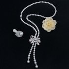 Women White 8mm Shell Pearl Starnds Tassel Necklace with Cubic Zirconia Bow Charm (SN702141)