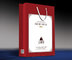 Customized Handle Black Gift Kraft Paper Bag with Design Stamping Logo supplier